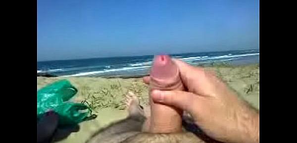  Hubby wanks on the beach